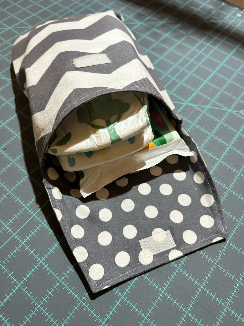 Gray Chevron Baby Bib and Diaper Pouch with Yellow Floral Accent